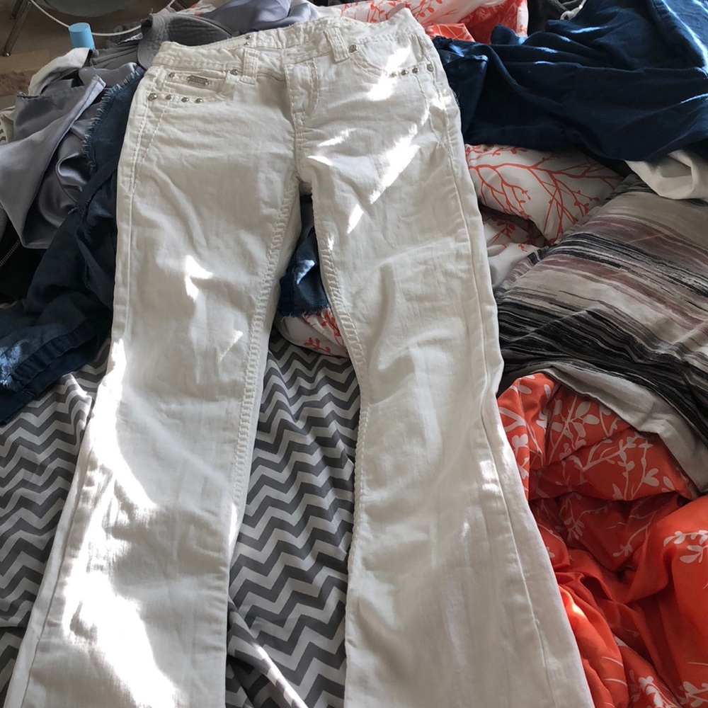 White flare jeans